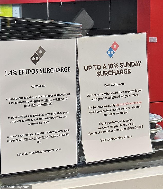 A Domino's Pizza customer was furious when he saw two signs in his local store stating an additional EFTPOS surcharge on all orders placed in store