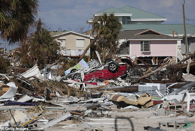 Experts have warned against buying property in states prone to climate disasters such as Florida (Photo: Destruction left in the aftermath of Hurricane Ian in Florida in 2022)