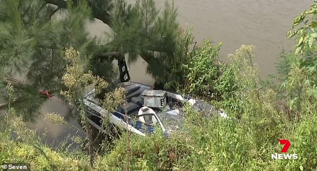 The boat Ms Jones was in crashed onto the riverbank before becoming trapped under trees