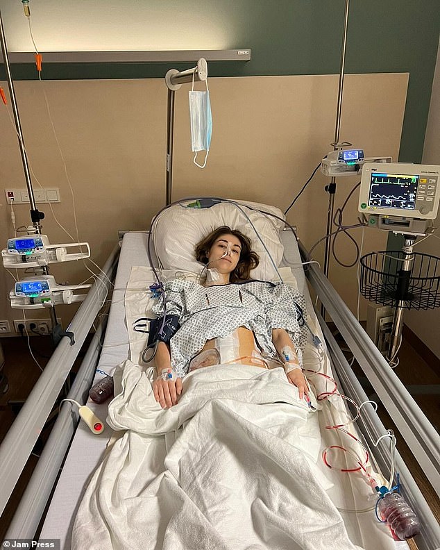 Kristina Bayus-Roszak, 29, was given less than two years to live if she did not undergo surgery to repair compression of the artery that supplies blood to her abdomen
