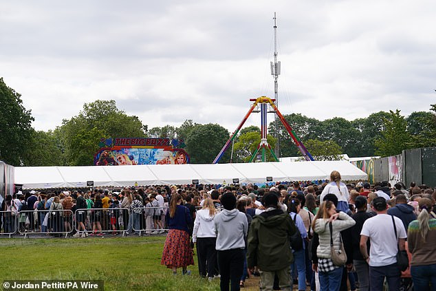 People attend the Lambeth Country Show on June 9, a day after four people were taken to hospital when a ride malfunctioned