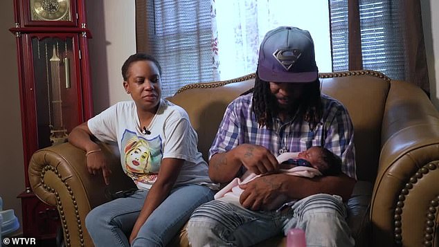 Breonni Jackson went into labor at the Taco-Bell just months after losing her son in a car accident.  She is pictured with her new daughter and her husband Jamarz Jackson