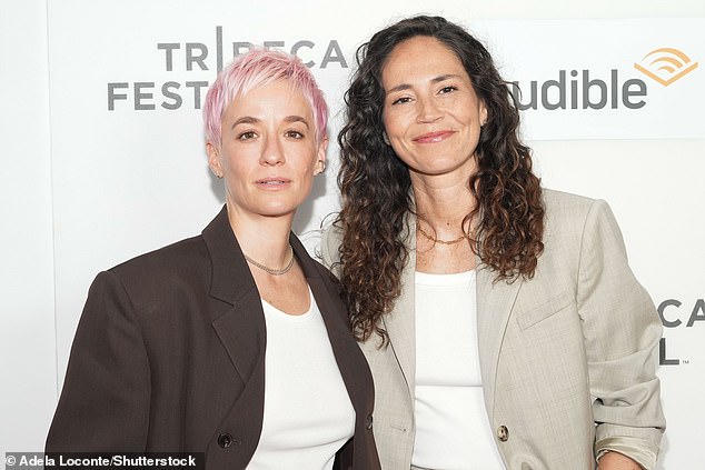 Rapinoe poses for a photo next to her fiancé Bird at the Tribeca Film Festival premiere this month