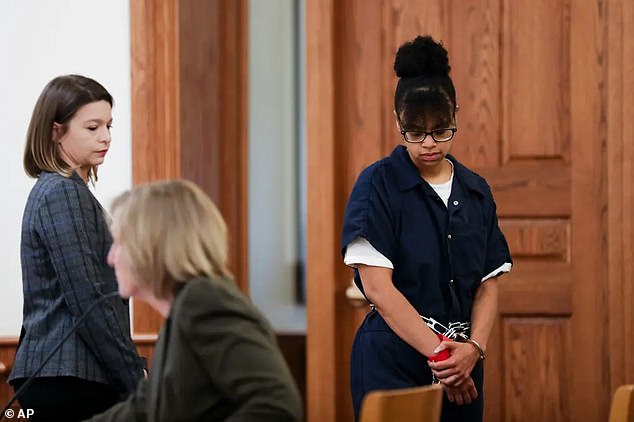 The children's mother, Elizabeth Archibeque (seen here at her own sentencing), was last year branded 