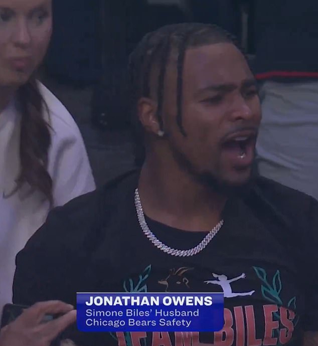Owens was there to support his wife and led the standing ovation after her floor exercise