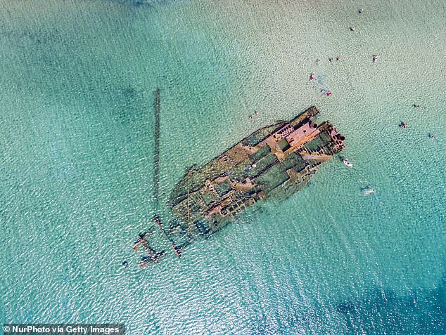 The 33-year-old man was swimming at the Epanomi Shipwreck attraction in Thessaloniki when he reportedly got into difficulty. File image shows the Epanomi wreck