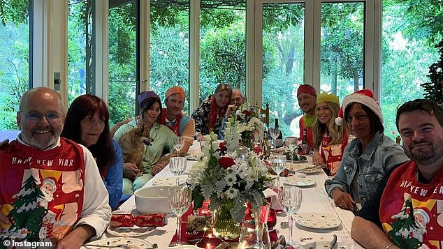 John was also seen celebrating Christmas with his family, but his entire face was not clearly visible in the image.  John is depicted at the end of the table