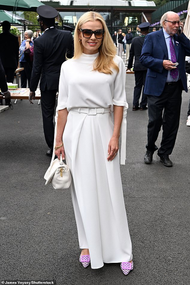 Meanwhile, Katherine Jenkins, 44, stole the show in a structured white dress and wore vibrant plaid purple sandals