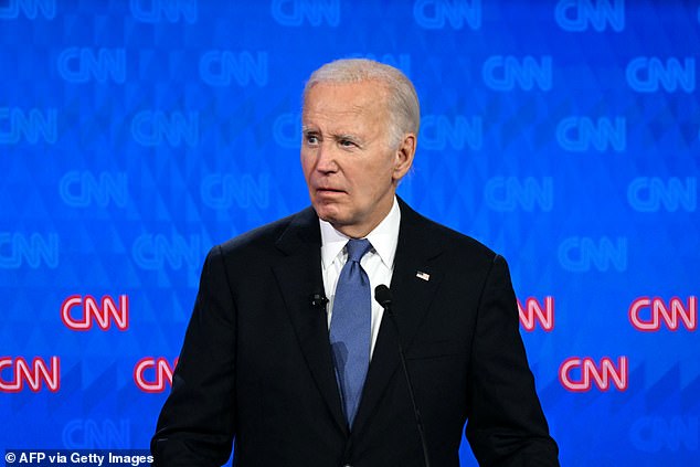 President Joe Biden looks on as he participates in the first presidential debate