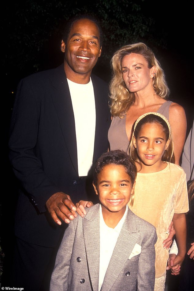 The father of six at a premiere with then-wife Nicole Brown and their children Sydney and Justin