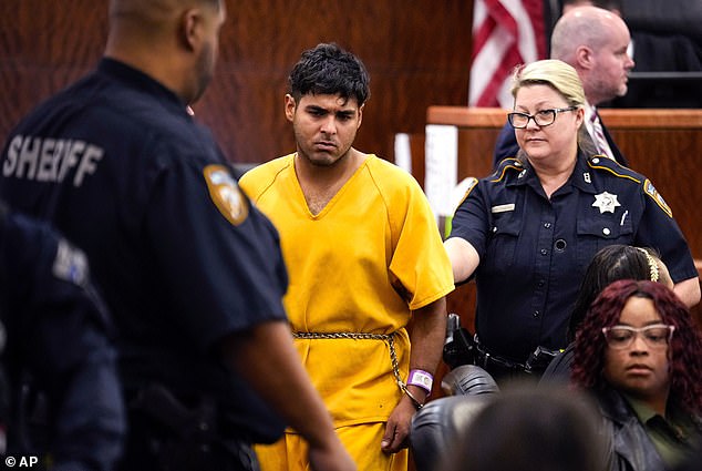 Johan Jose Rangel-Martinez, 21, one of two men accused of killing 12-year-old Jocelyn Nungaray, is led from the courtroom by deputies Tuesday