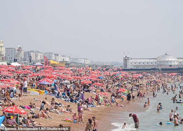 June was a month of contrasts for many, with a cool first half of the month offset by warmth later in the month. Pictured: Beachgoers in Brighton, 26 June 2024