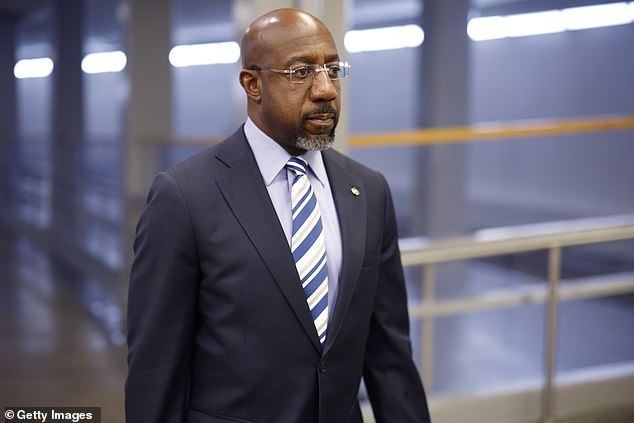 Senator Raphael Warnock said he would do everything he could to ensure Biden and Harris are re-elected