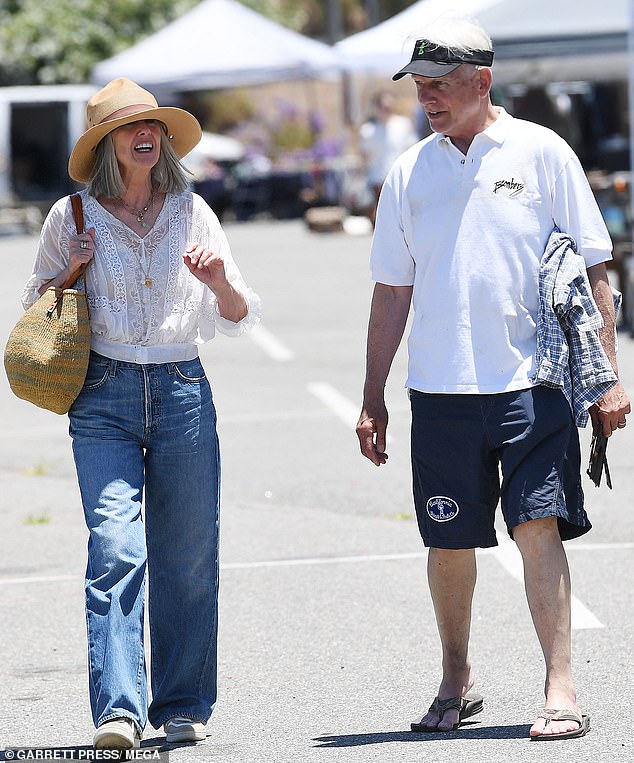 The NCIS actor opted to keep it casual with a pair of navy shorts, a white polo shirt, slides and a sun visor