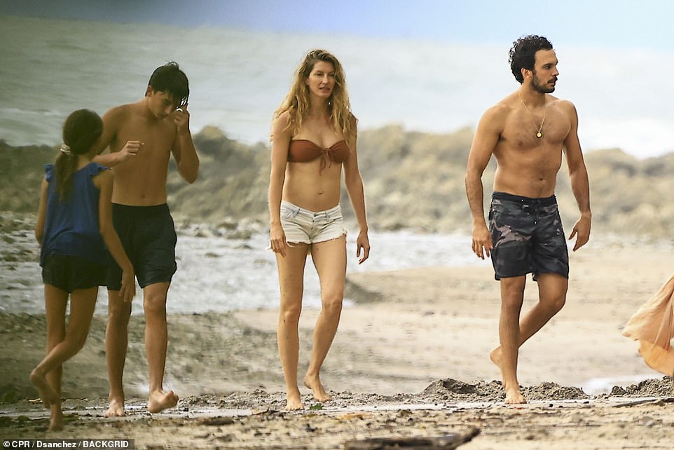 The star was spotted on the beach with her two children and Joaquim