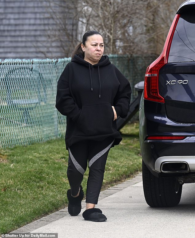 Adele Andalaro, pictured outside her Roslyn Heights home, inherited the single-family home in Queens and was furious when she discovered squatters had taken it over