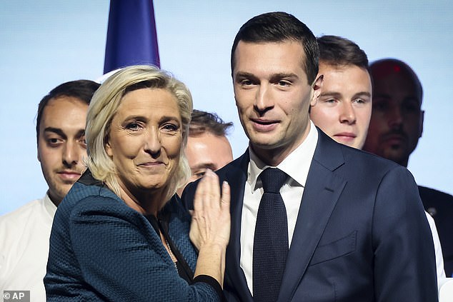 Leader of the French far-right Rassemblement National Marine Le Pen and the party's lead candidate for the upcoming European elections Jordan Bardella during a political rally on June 2, 2024 in Paris