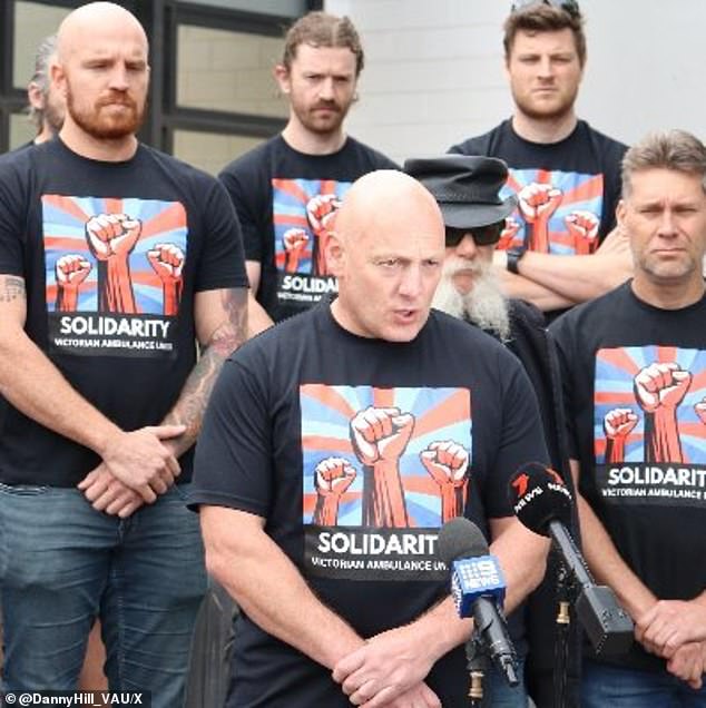 Danny Hill (pictured centre) from the Victorian Ambulance Union said it was not just a case of paramedics working 18-hour days.
