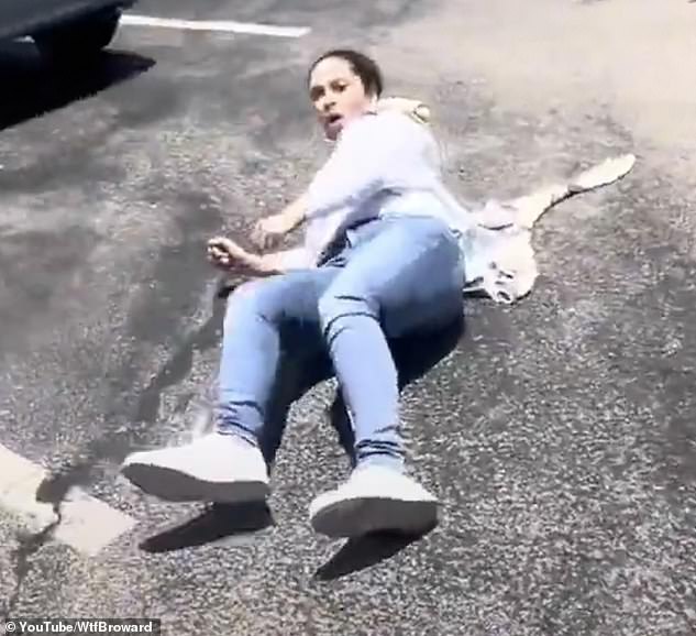 Karen appears to be in complete shock after being knocked to the ground