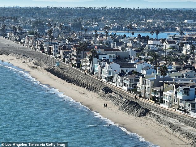 The move signals financial troubles for the insurance giant, which is currently covering homes destroyed by wildfires. Pictured is a row of homes in Long Beach, California