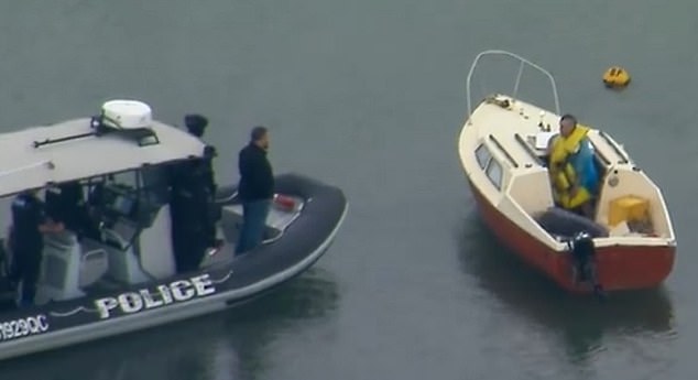 Police allege the man barricaded himself on a boat in Pumicestone Passage, in the Sunshine Coast's south, before allegedly arming himself with knives and dousing himself in petrol