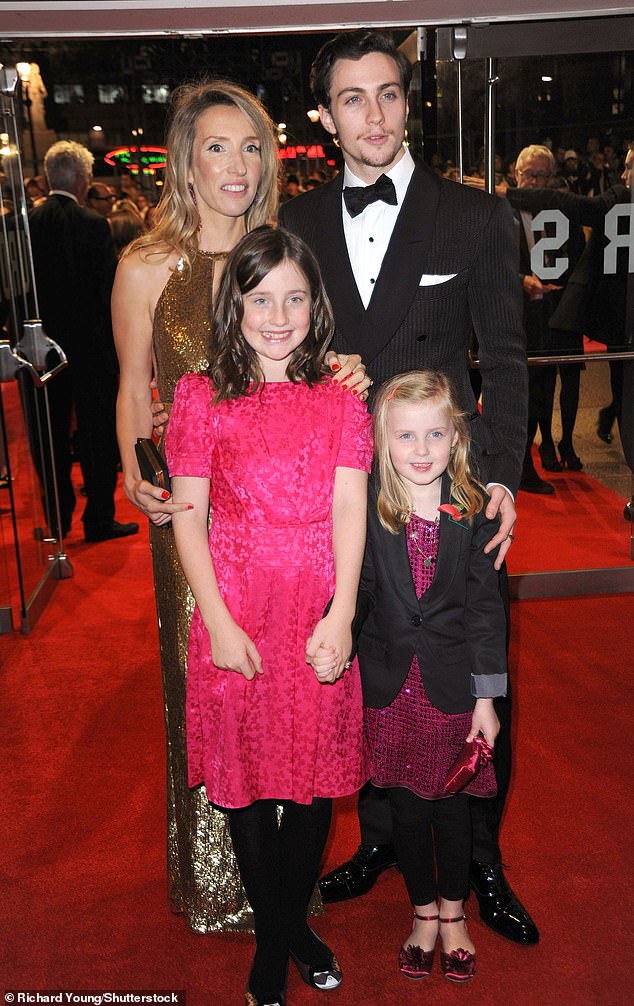 She revealed that the interest has now 'kind of died down', after the couple have been together for 14 years (pictured with daughters Wylda, 13, and Romy, 12, in 2009)