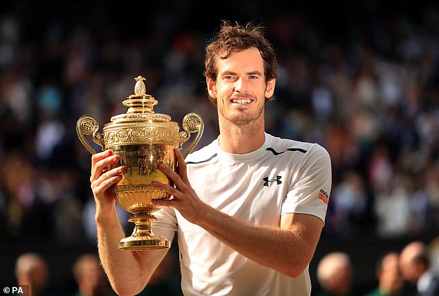 Andy Murray with the trophy after winning the men's singles final at Wimbledon 2016