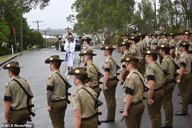 Soldiers lined the streets in March to wave goodbye to Corporal Fitzgibbon