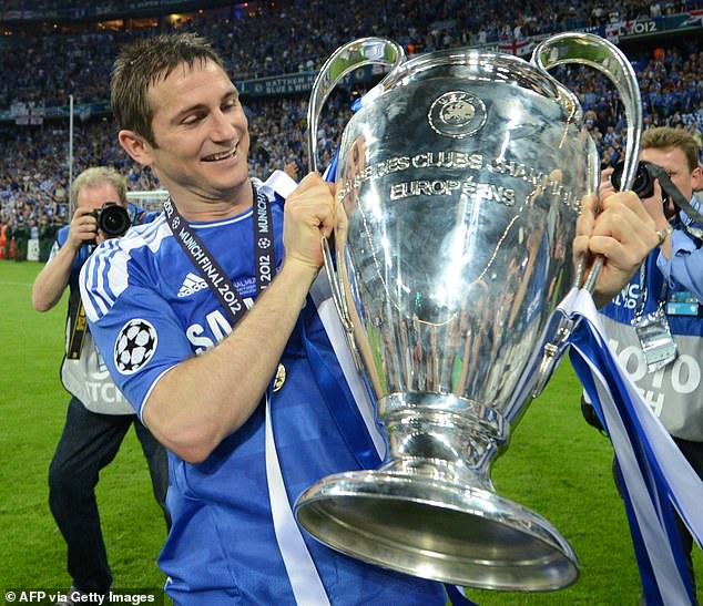 Frank Lampard pictured holding the European Cup after Chelsea famously won it 12 years ago