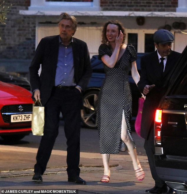 The 78-year-old Roxy Music star looked handsome in a navy suit over a blue shirt as he and Tatty climbed into his chauffeur-driven Range Rover