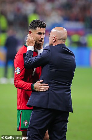Martinez comforts Ronaldo after his missed penalty