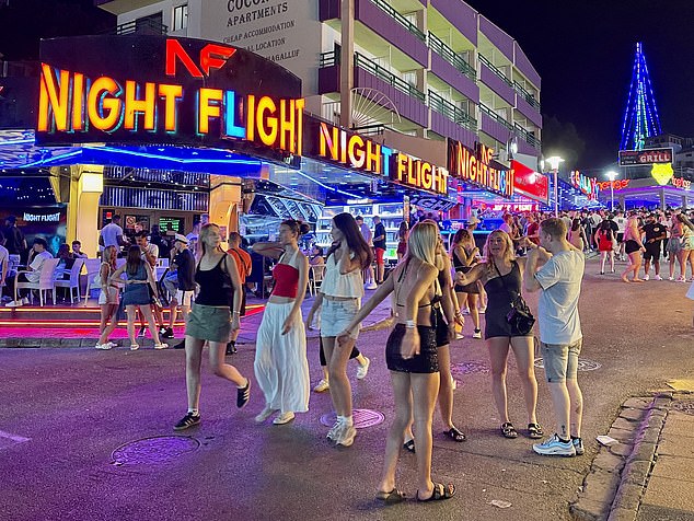 Pictured: Hordes of tourists took over the strip late into the night as they continued their partying