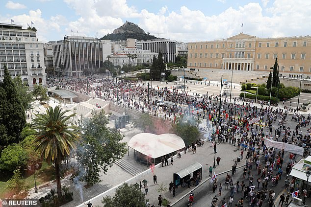 Critics have slammed the new measure as damaging to workers' rights, claiming that profit-hungry companies can now demand that their employees work six days a week without facing any consequences (pictured from the 2021 workers' protests in Athens).