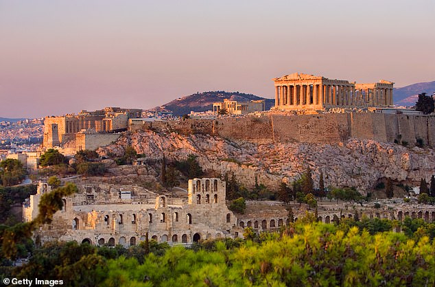 Critics argue the measure will give employers an excuse not to hire much-needed additional staff, leaving more young people without jobs (Pictured: A general view of the Acropolis of Athens, Greece)