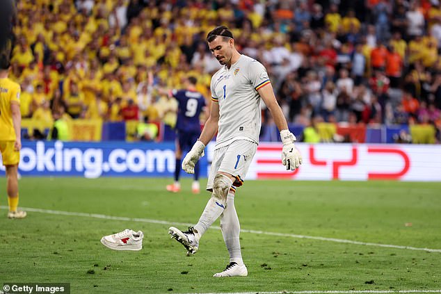 Nita frustratingly kicked another shoe away, ending Romania's Euro 2024 campaign