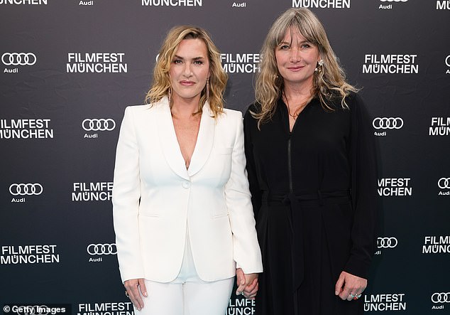 The Oscar winner styled her hair in soft waves and wore a radiant palette of makeup to accentuate her natural beauty (pictured with Kate Solomon)