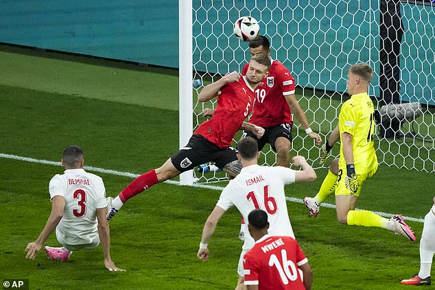 Demiral (left) scored from close range to give his team a 1-0 lead after 57 seconds, the fastest goal ever scored in the knockout stages of the European Championship.