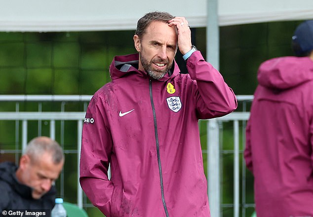 England manager Gareth Southgate, pictured during Monday's training session, has decisions to make