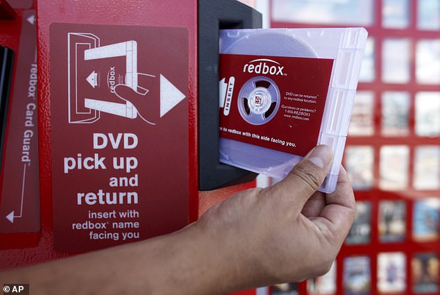 CSSE wanted to combine Redbox's DVD rental business with its streaming services (Pictured: A DVD is handed out at a kiosk in Los Angeles)