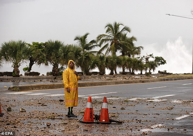 Across the Caribbean, photos and videos showed debris strewn across streets and fallen trees