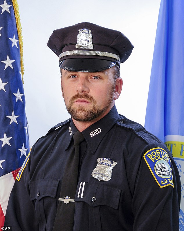 This undated photo released by the Boston Police Department shows Officer John O'Keefe