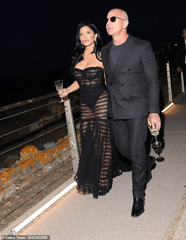 Billionaire Jeff Bezos and Lauren Sanchez were also in attendance, with Lauren wearing a chic black sheer maxi dress from the fashion house
