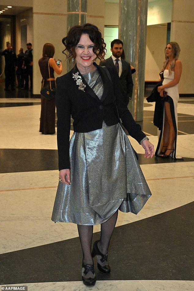 ABC journalist Annabel Crabb arrived in a sleek silver dress and black jacket