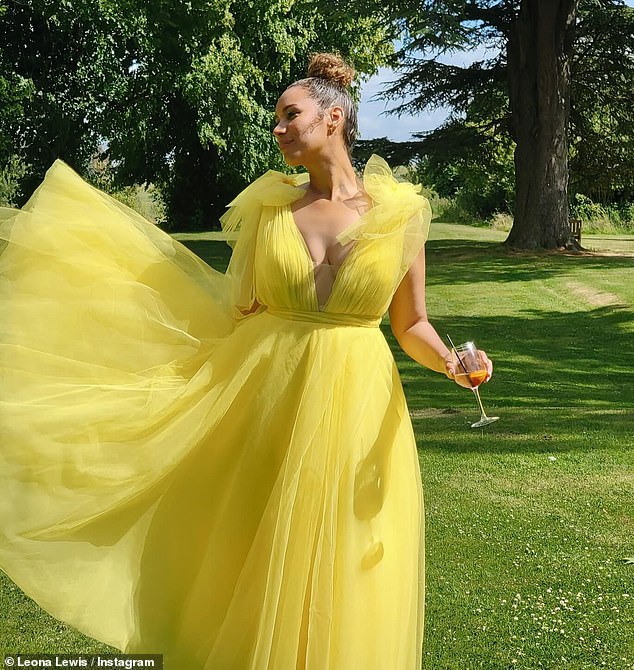 Leona was dressed to the nines for the occasion. Her beautiful bright yellow dress had a plunging neckline, a full skirt and bows that were tied on the shoulders.