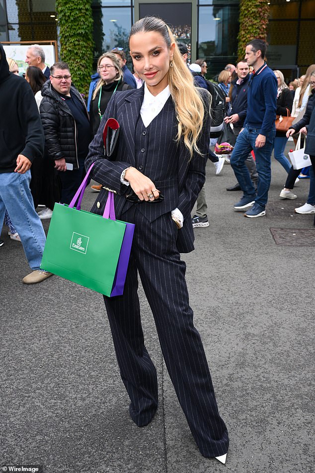 Made In Chelsea star Sophie Hermann wore a pinstripe outfit at the All England Lawn Tennis and Croquet Club