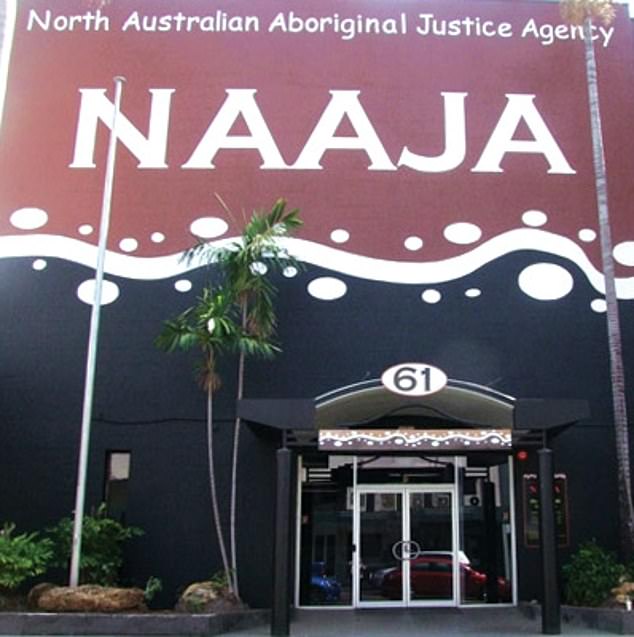Mr Woodbury, the chair of the North Australian Aboriginal Justice Agency (NAAJA), has been called upon to resign after it emerged he assaulted his pregnant partner by standing on her stomach. The NAAJA building in Darwin is pictured