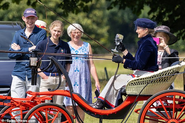 Sophie and Edward's daughter, Lady Louise (second from left), watched her mother take part in the challenge