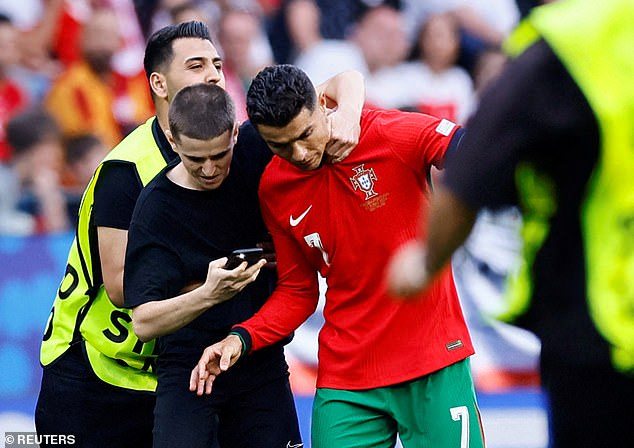Germany were fined twice for invading pitches during Portugal's matches with Turkey and Georgia - with Cristiano Ronaldo being approached by numerous fans in the match with the latter