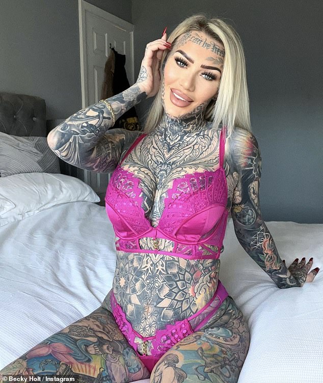The model and OnlyFans creator, who has £30,000 worth of tattoos - which cover 95 per cent of her body - says getting her genitals tattooed was 'horrible'