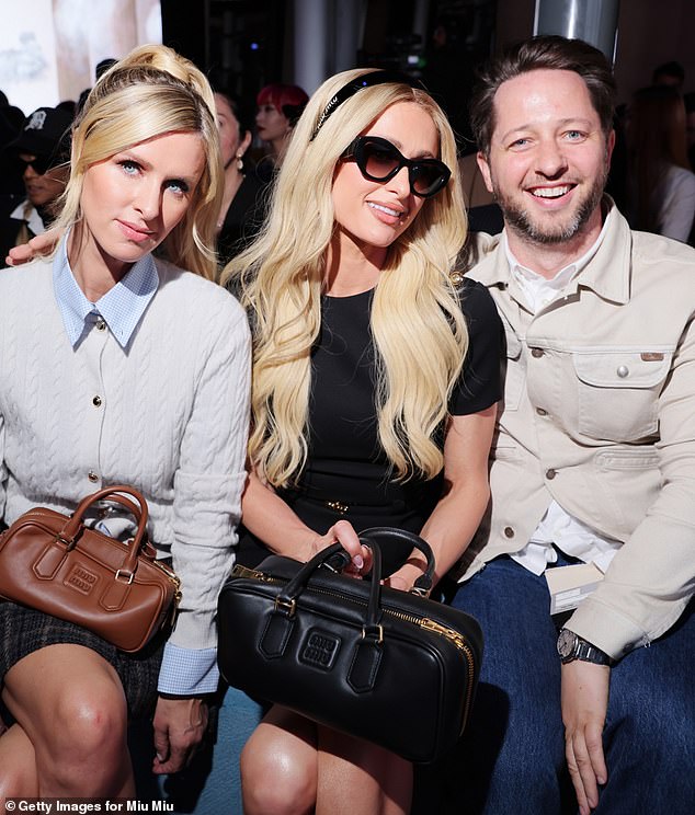 Blasberg has built influence and connections as a top fashion journalist, socialite and television personality (pictured with Nicky and Paris Hilton)